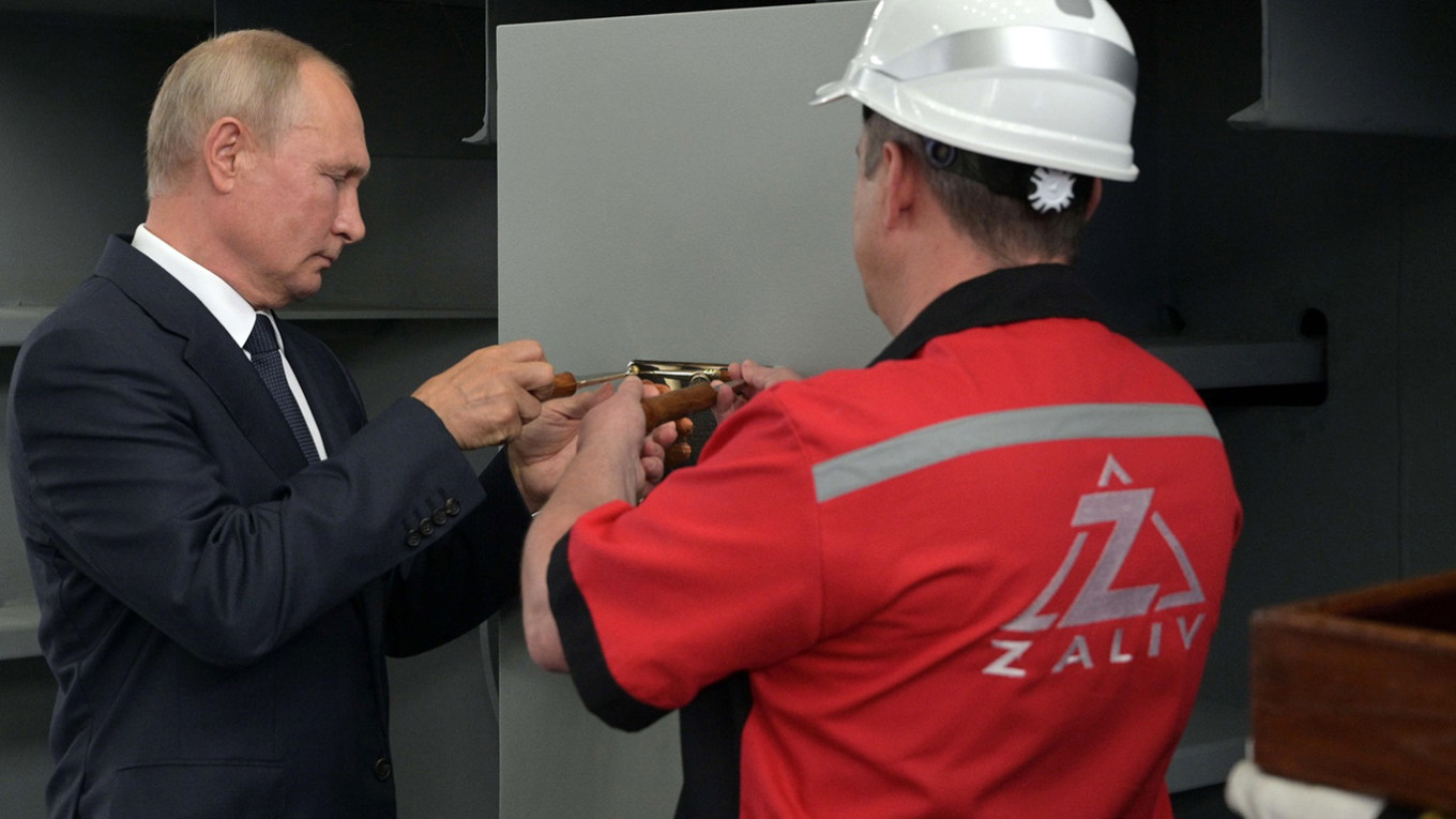 Putin at the ceremony of launching the universal landing ship Ivan Rogov. kremlin.ru