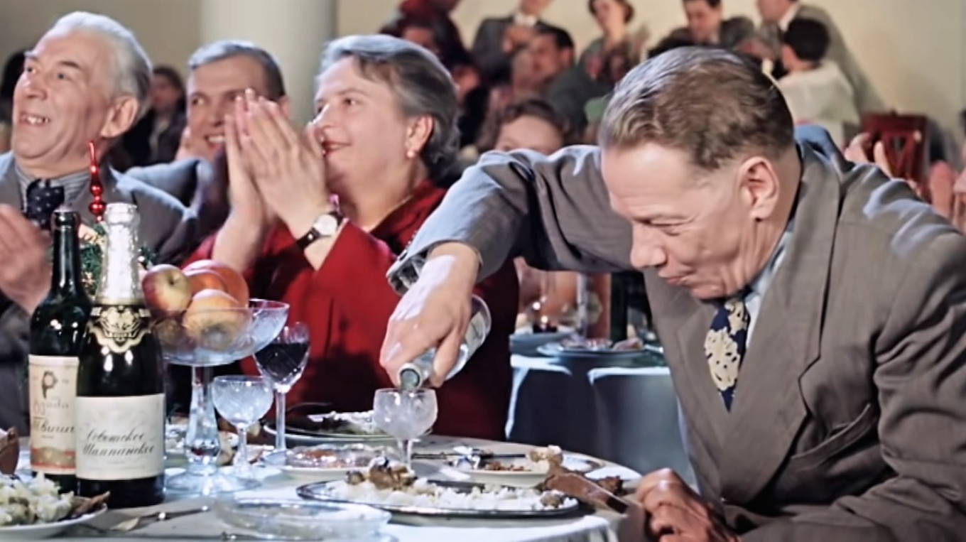 
					Although the food was real in “Carnival Night,” the vodka was just water — it took great skill to drink it down as if it were alcohol.					 					Still from the movie “Carnival Night,” 1956.				