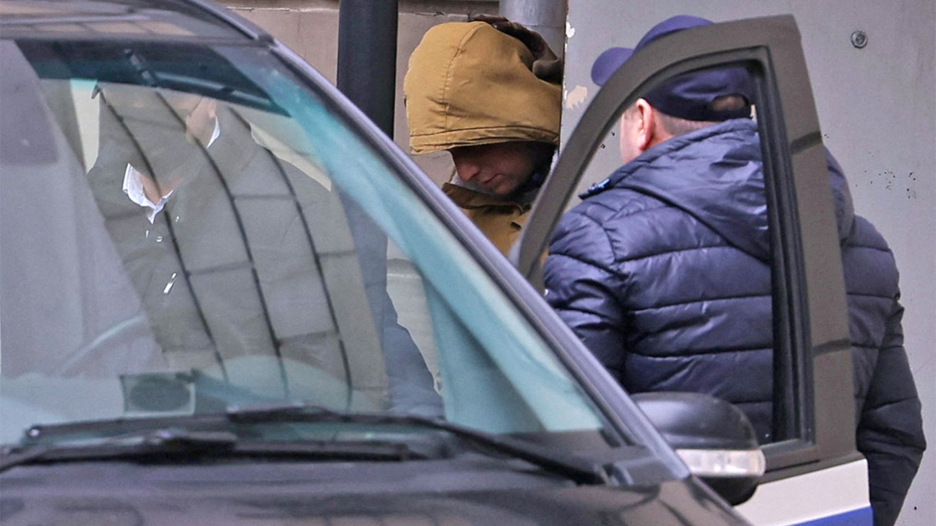 WSJ reporter Evan Gershkovich leaves a court building in Moscow. Evgenia Novozhenina / Reuters