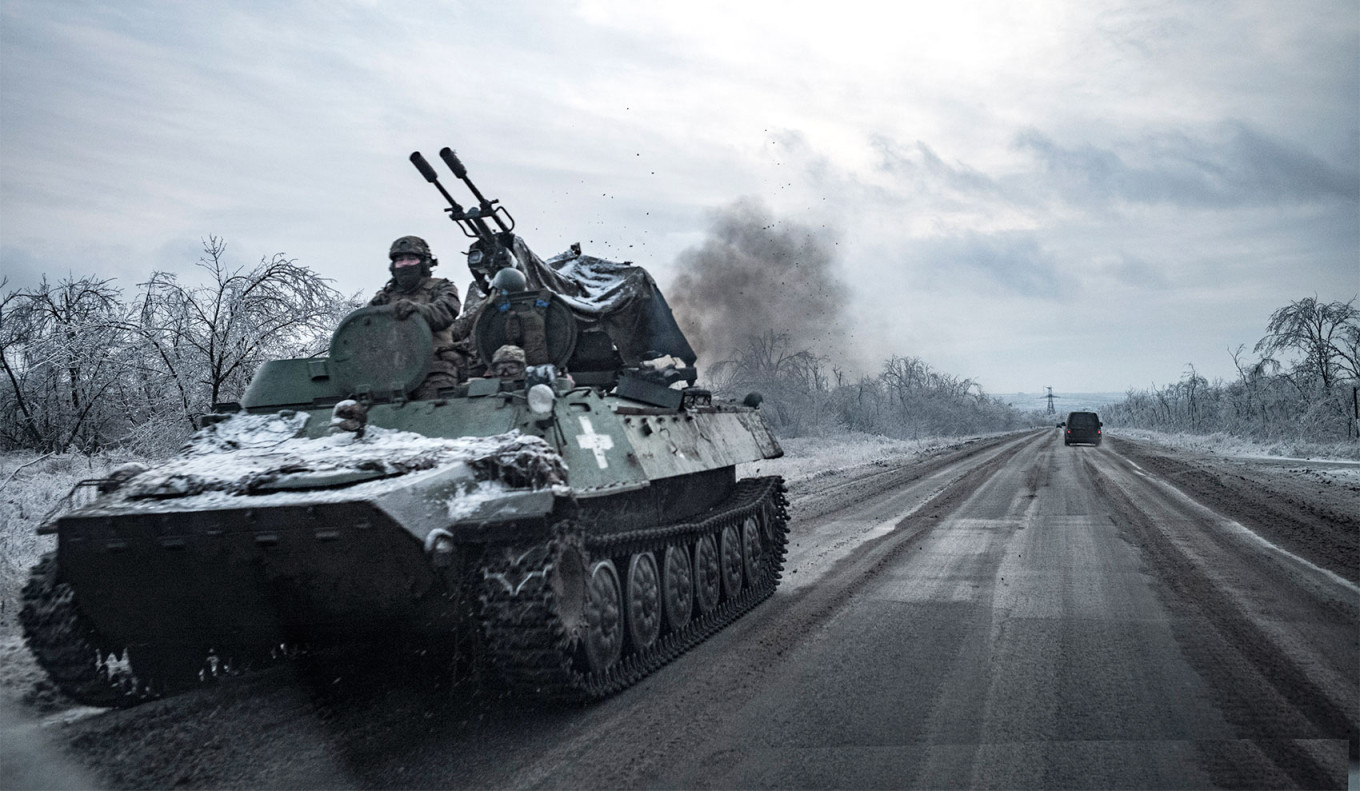 
					Tanks roll down a road in the area of Chasiv Yar.					 					Nicolas Cleuet				