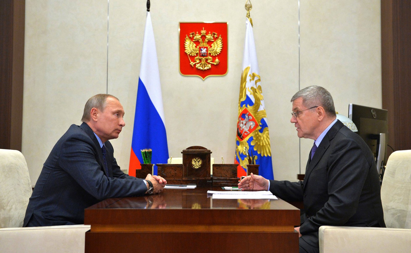 
					Russian President Vladimir Putin listens to Yury Chaika in the Kremlin in Moscow, Russia.					 					Kremlin Press Service				