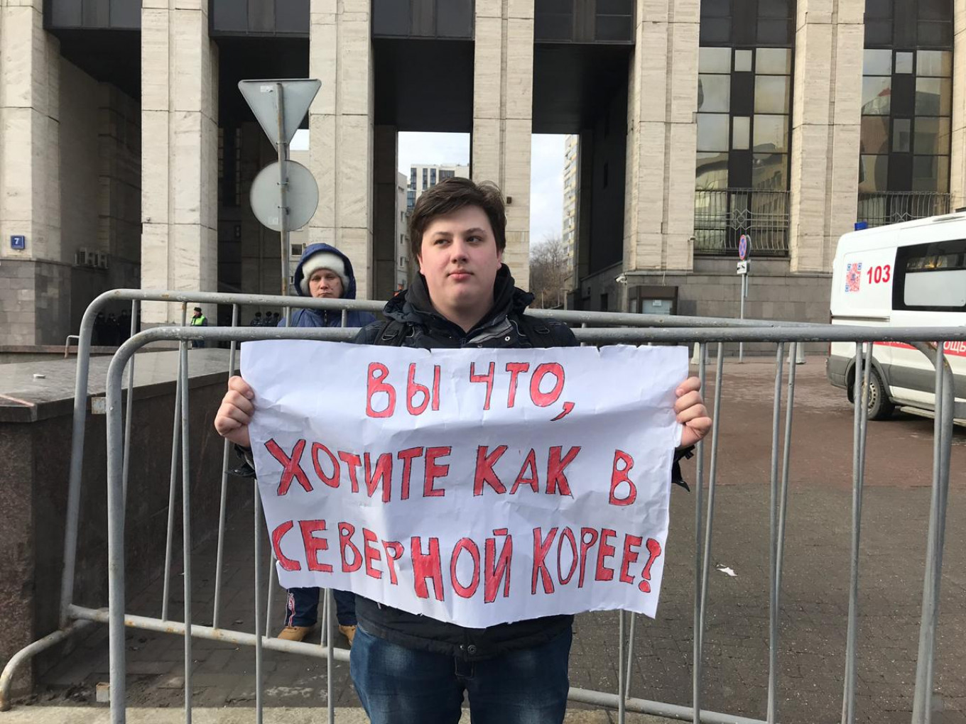 
					Alexei, 22, said he would likely emigrate if Russia cut itself off from the global internet. Sign reads: "You what, want it to be like in North Korea?"					 					Evan Gershkovich / MT				