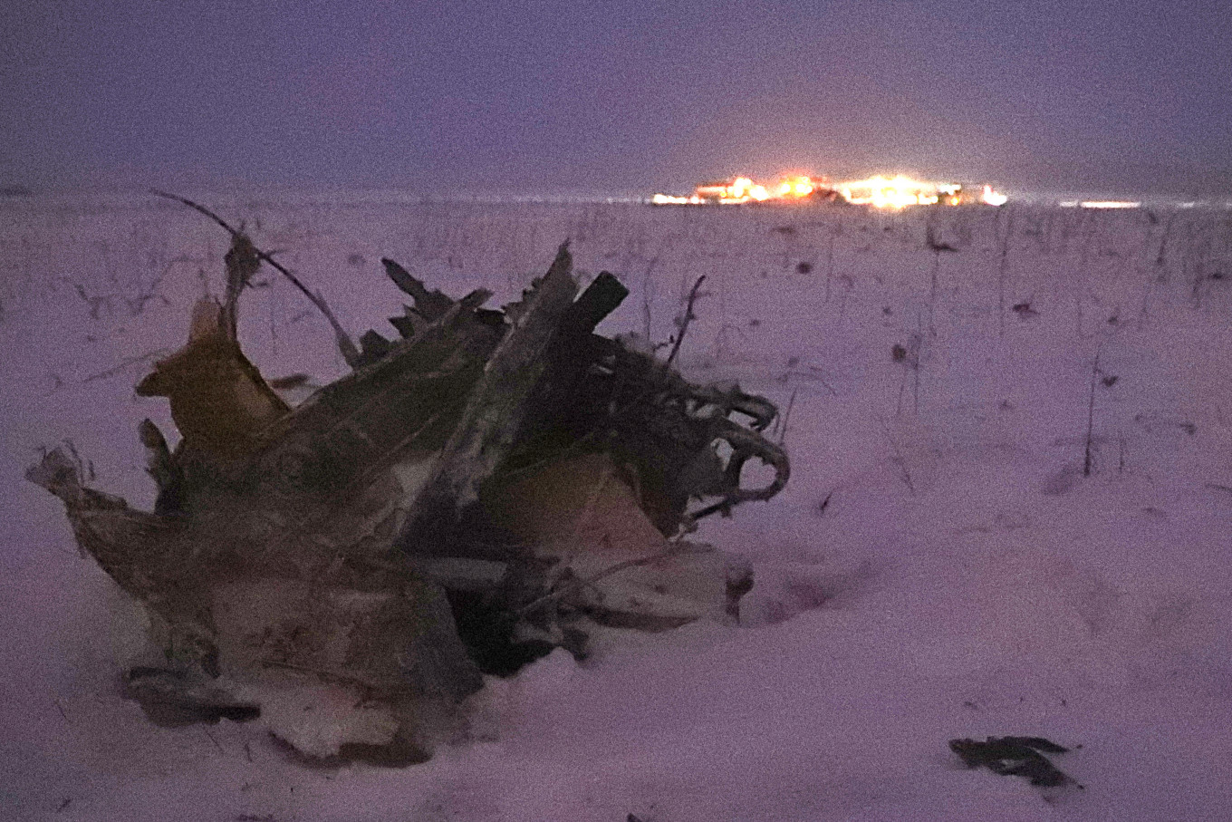 
					Images from the scene show debris scattered across snowy fields.					 					Stanislav Krasilnikov/TASS				