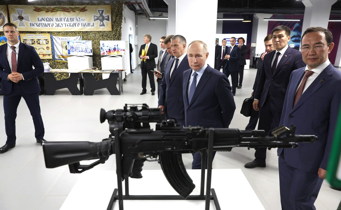 
					Vladimir Putin, Head of the Sakha Republic (Yakutia) Aisen Nikolayev (L-R) view industrial products used in the zone of Russia's special military operation on display at the Kvartal Truda [Labour Quarter] creative cluster in Yakutsk.					 					Peter Kovalev / POOL / TASS				