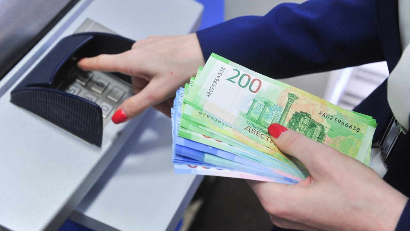 Russians’ Overdue Loans Hit Record High The Moscow Times