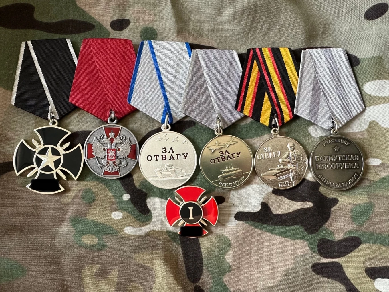 
					The medals awarded to Roman for his service in the Wagner Group.					 					Personal archive				