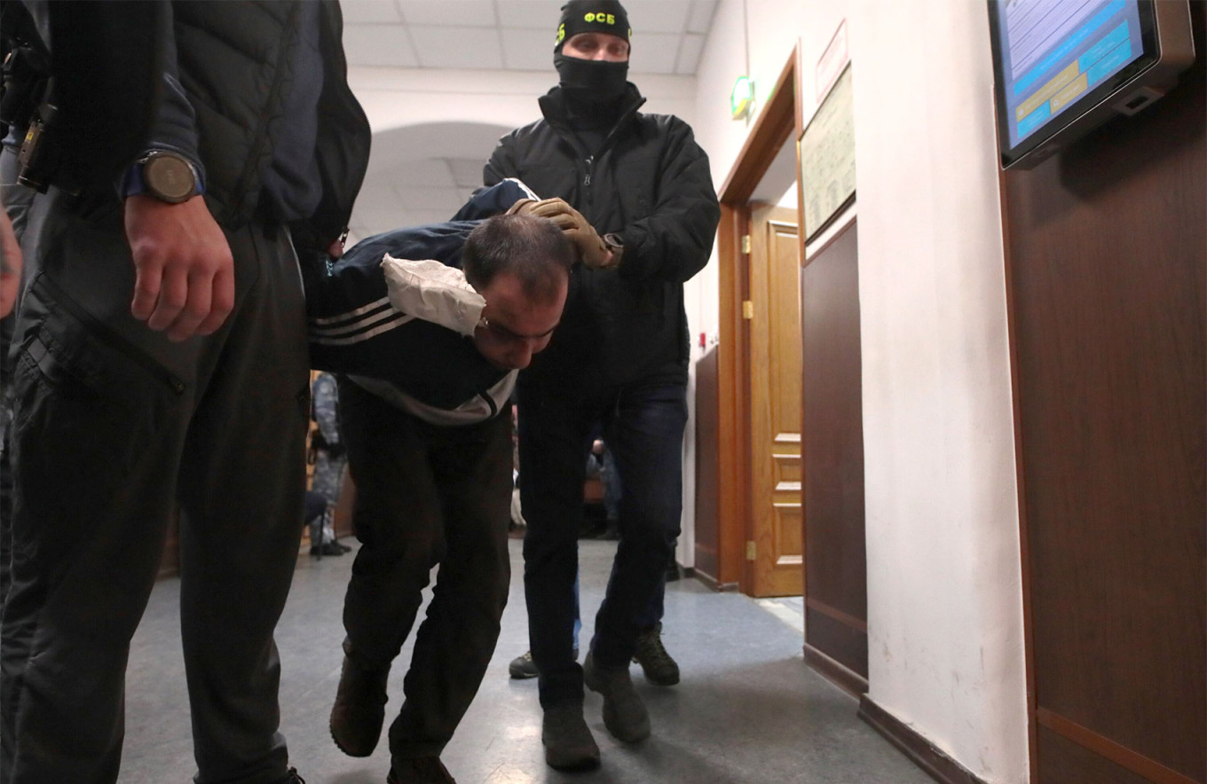 
					Rachabalizoda Saidakrami Murodali, detained on suspicion of attack at Crocus City Hall.					 					Vasily Kuzmichenok / Moskva News Agency				