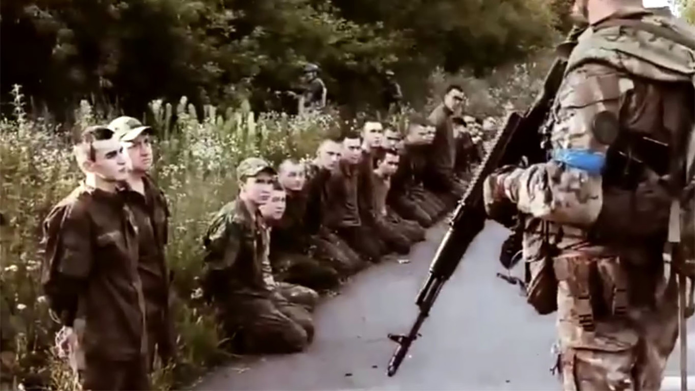 
					Russian conscripts surrender to the Ukrainian armed forces in the Kursk region.					 					Video grab				