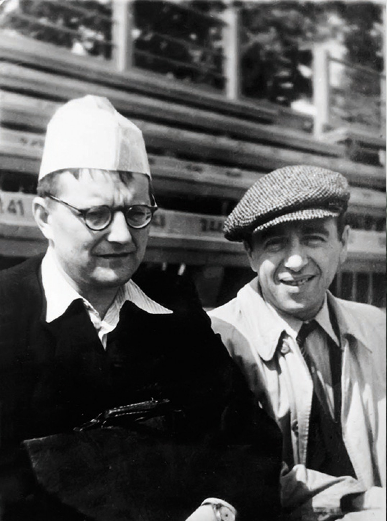 
					Shostakovich and Matvei  Blanter at the old Moscow Dinamo Stadium, July 1947					 					Courtesy of DSCH Publishers				