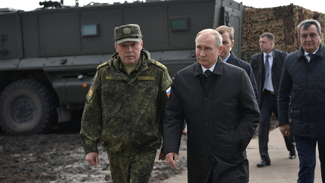 
					Chief of General Staff Valery Gerasimov and Vladimir Putin					 					Kremlin.ru				