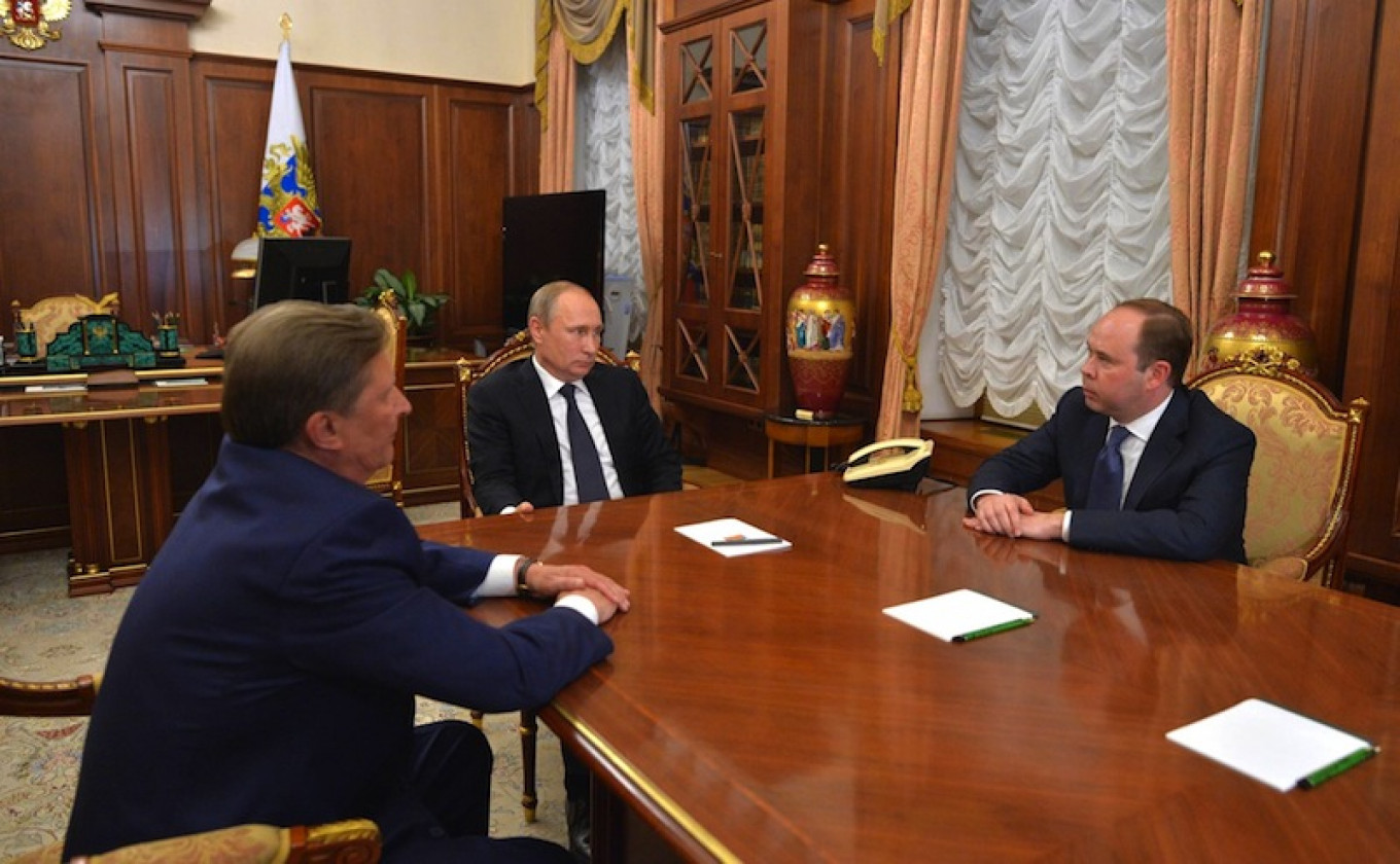 
					Vladimir Putin (C) meets with Sergei Ivanov (L) and Anton Vaino at the Kremlin in Moscow, Aug. 12, 2016. 					 					Kremlin Press Service				