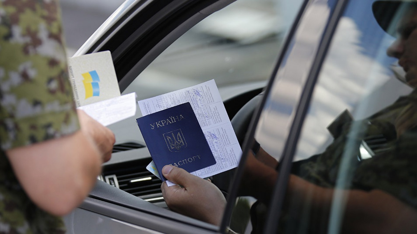 Russia Opens First Center To Issue Russian Passports To East Ukrainians The Moscow Times