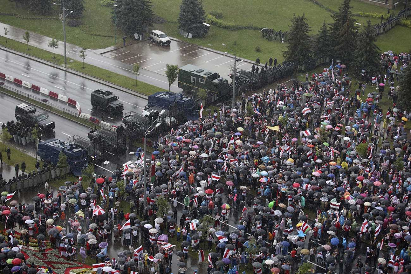 
					Demonstrators in Minsk on Sunday.					 					AP / TASS				