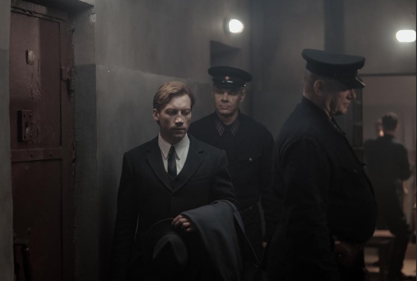 Sasha Kornyev (Aleksandr Kuznetsov) visting Stepniak in prison. Still from "Two Prosecutors" courtesy of Cannes Film Festival