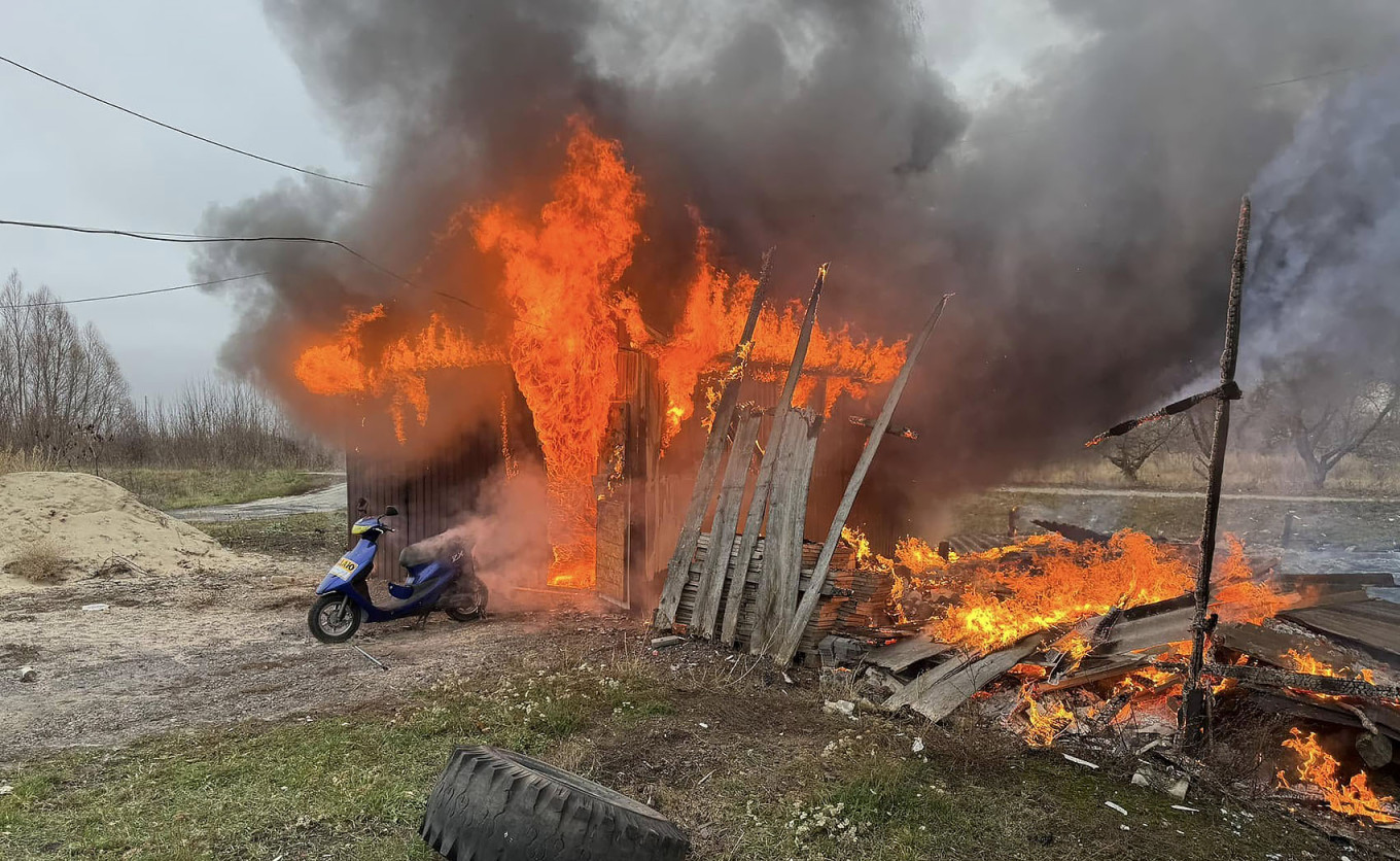 
					Fire after shelling in a village in the Kursk region.					 									