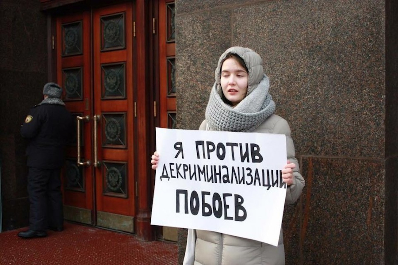 
					Women’s rights activists demonstrated outside State Duma building, hoping lawmakers would reconsider.					 					Elena Plotnikova / TASS				