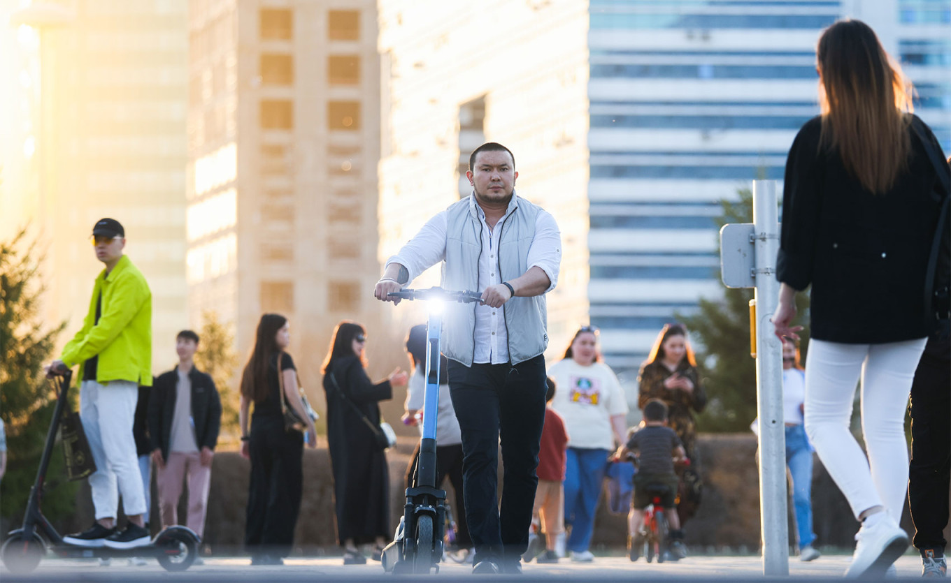 
					Locals in a square in Astana, Kazkahstan's capital.					 					Sergei Fadeichev / TASS				