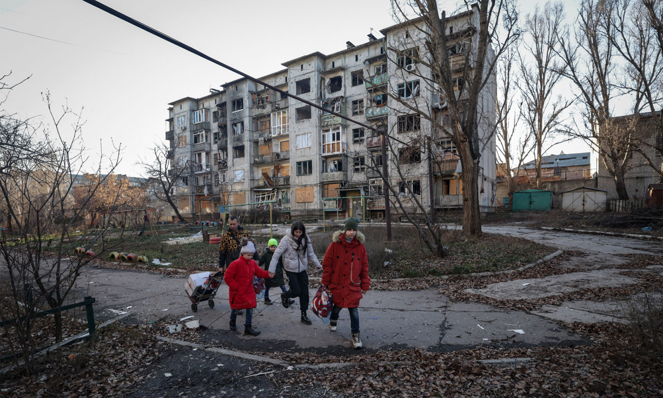 
					Children go to a bomb shelter in Bakhmut, Ukraine.					 					Danylo Dubchak / Donbas Frontliner				