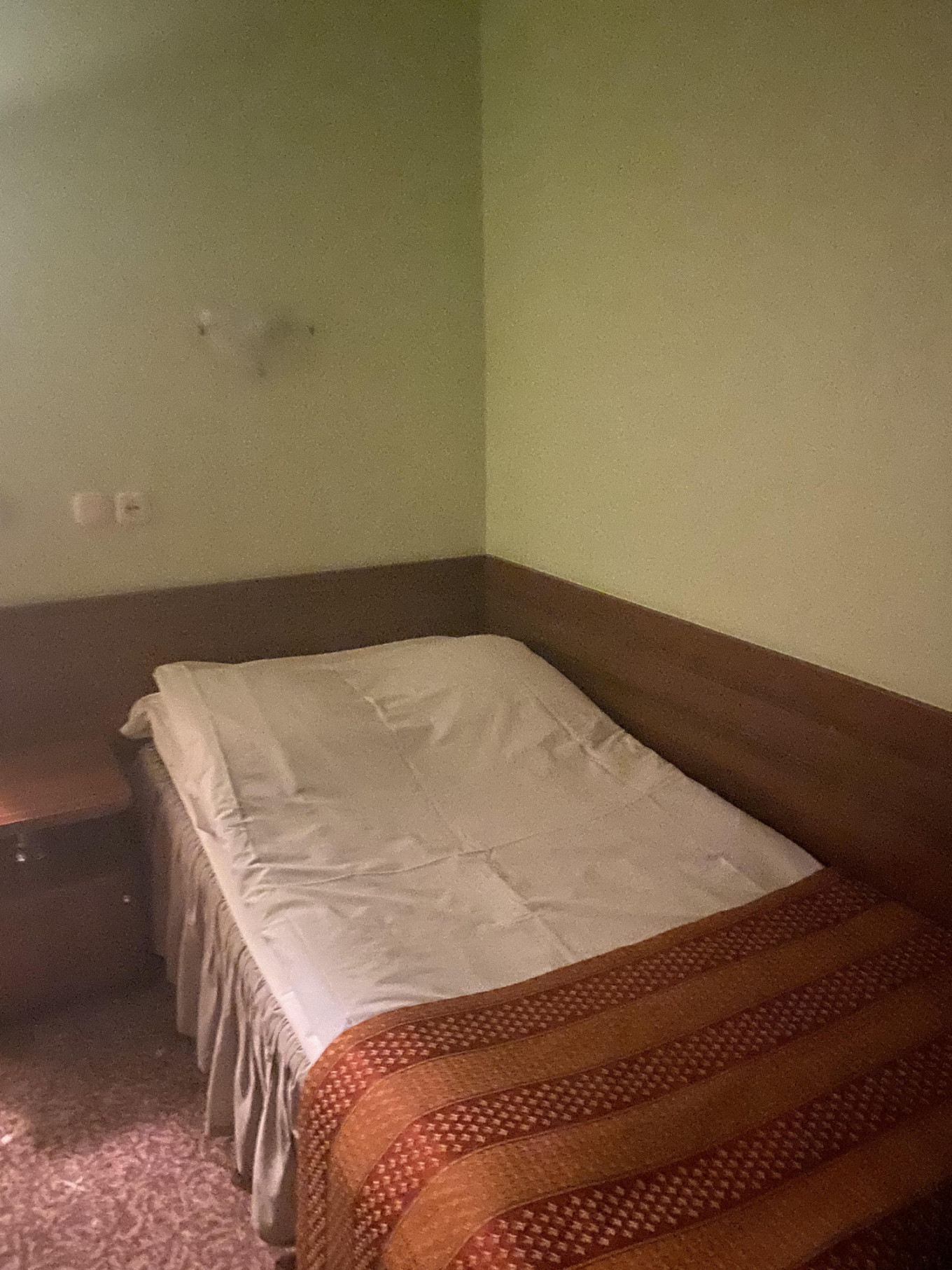   				Migrants are paying thousands of dollars to stay in basic hotel rooms like this one in the Hotel Sputnik in Minsk.				 							