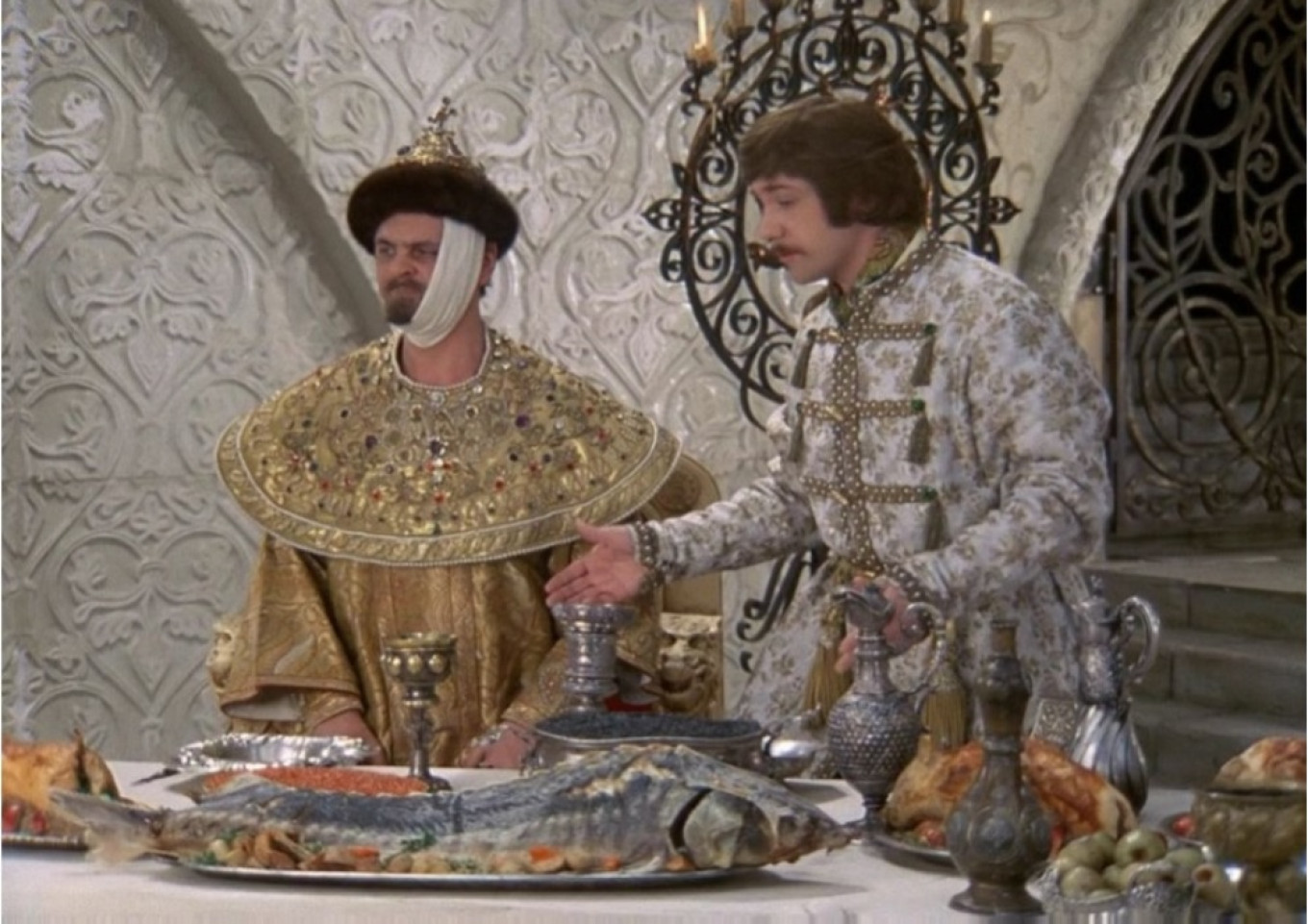 
					"Black caviar, red caviar..." 					 					Still from "Ivan Vasilyevich Changes Profession," 1973				