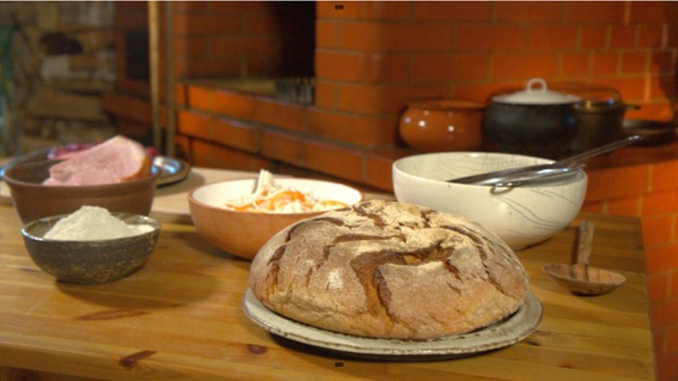 
					Bread was the main dish on a peasant's table.					 					Pavel and Olga Syutkin				