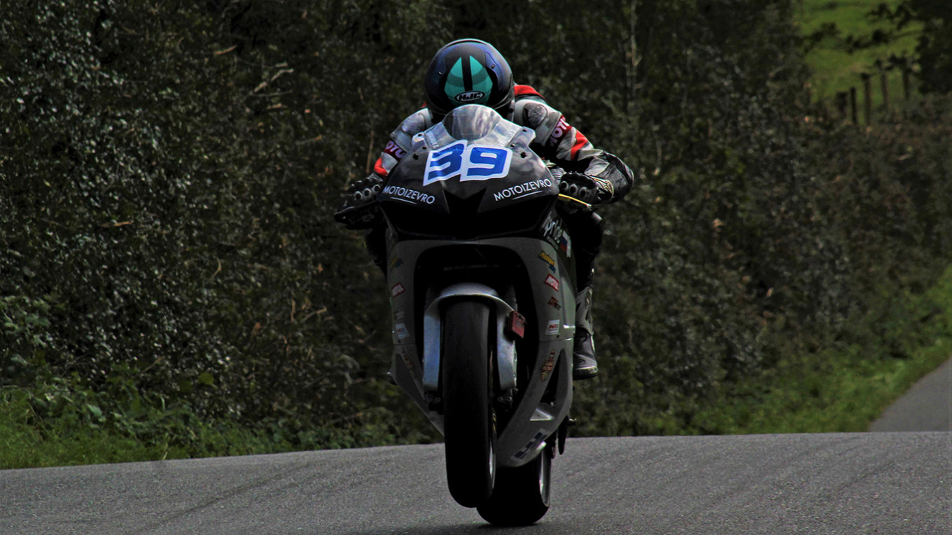 
					Danila Krasniuk races over the bumps of Cookstown with one wheel pawing the air.					 					Ben McCook / MT				