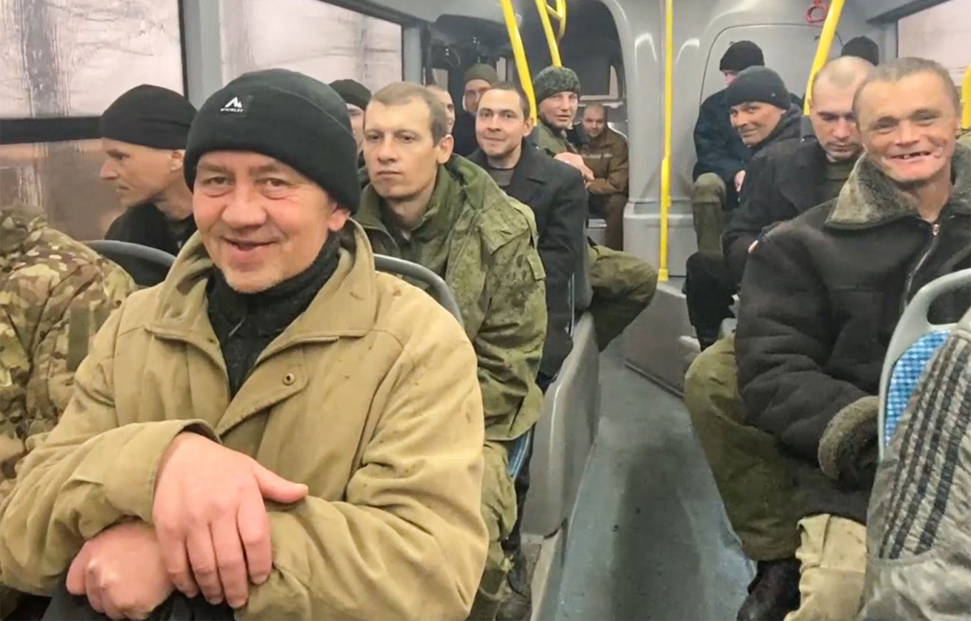 Russian soldiers seen shortly after liberation during a prisoner exchange.  Ministry of Defense of Russia / TASS