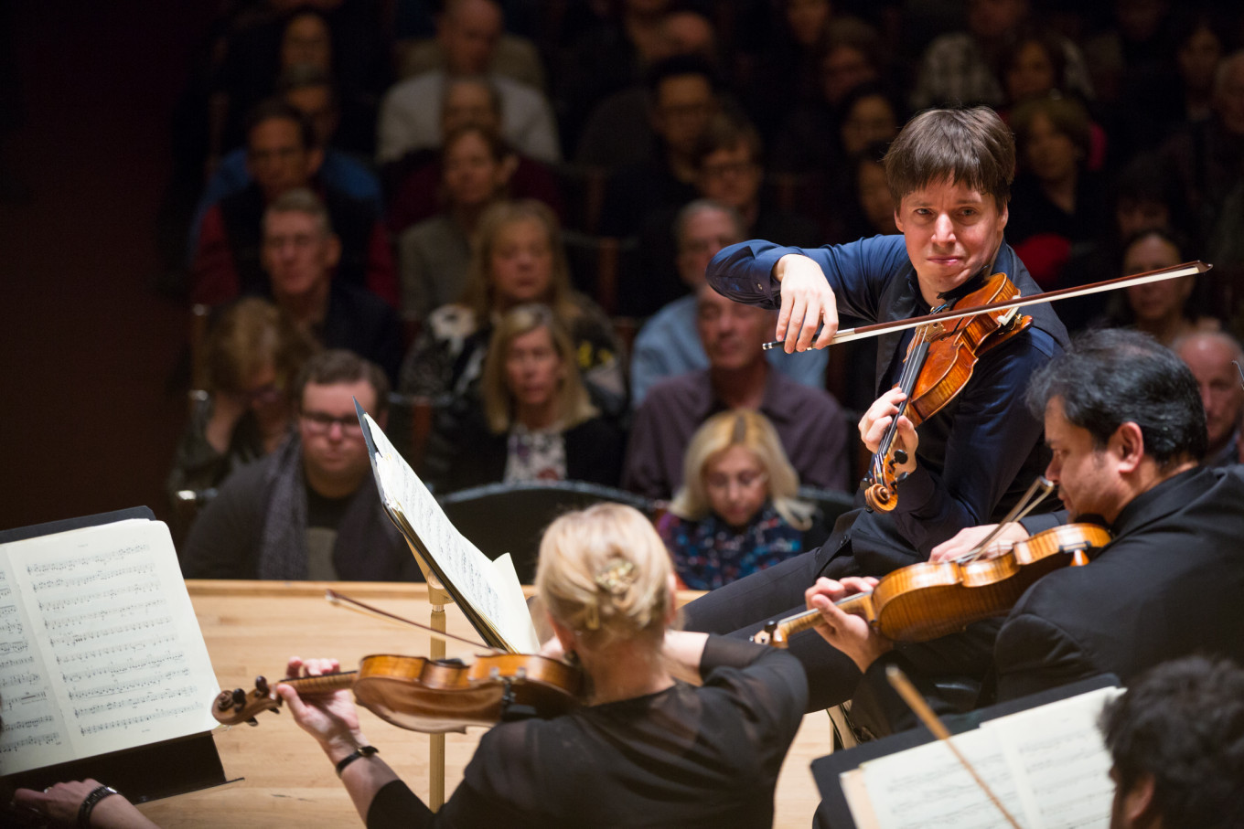 
					Joshua Bell conducting and making music.					 					Robert Torres / ASMF				