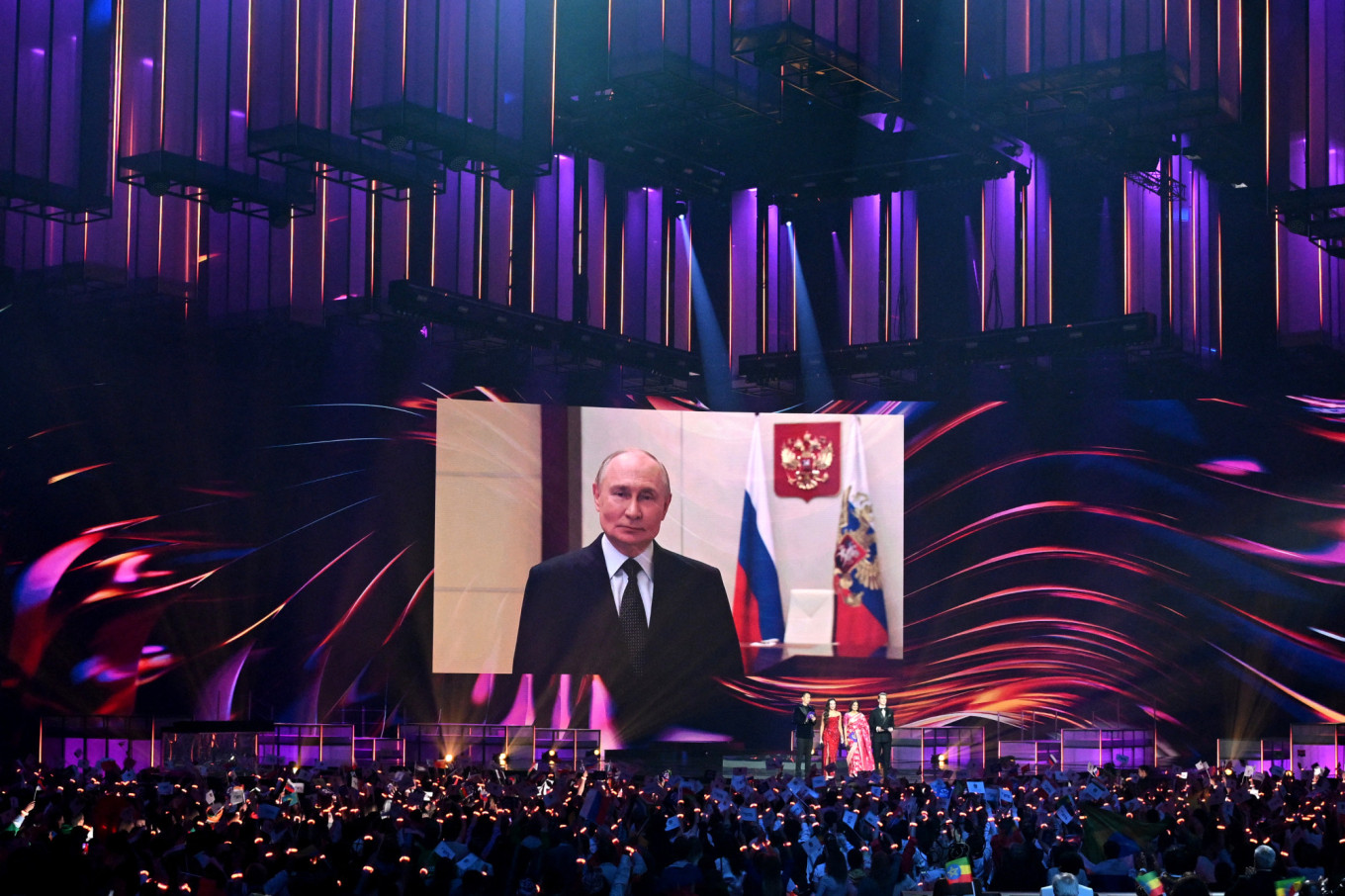 
					President Vladimir Putin addresses the Intervision audience in a pre-recorded address.					 					Olesya Kurpyayeva / AFP				