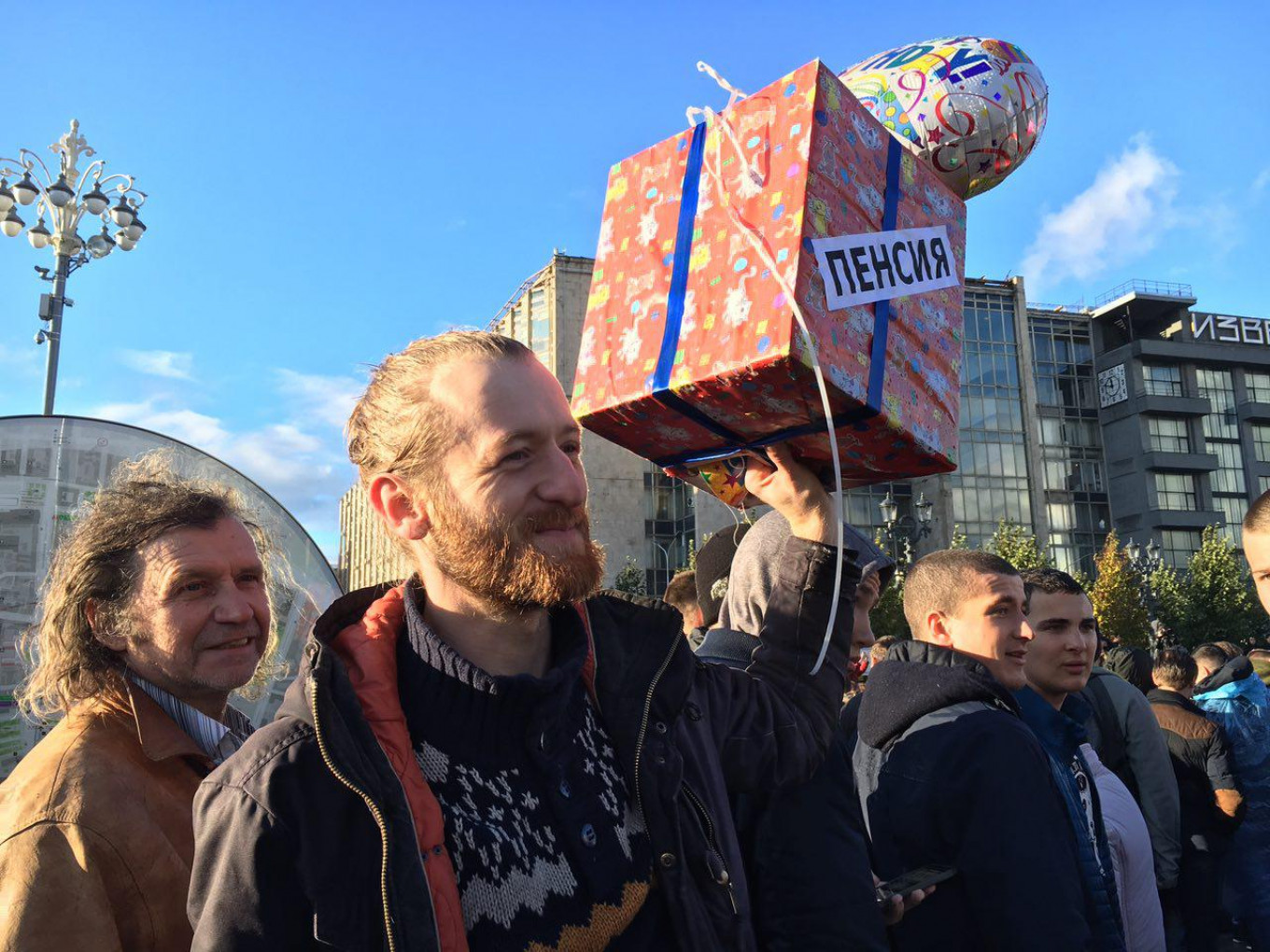 
					In Moscow, Yevgeny carries a present labeled "Retirement," which he has been meaning to give to Putin "for five years."					 					Ksenia Churmanova / For MT				