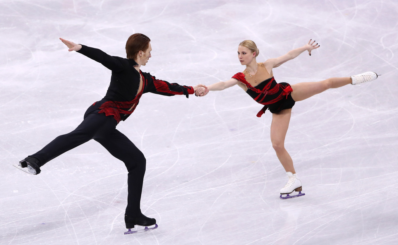 Yevgenia Tarasova and Vladimir Morozov perform in the Pair Skating Short Pr...