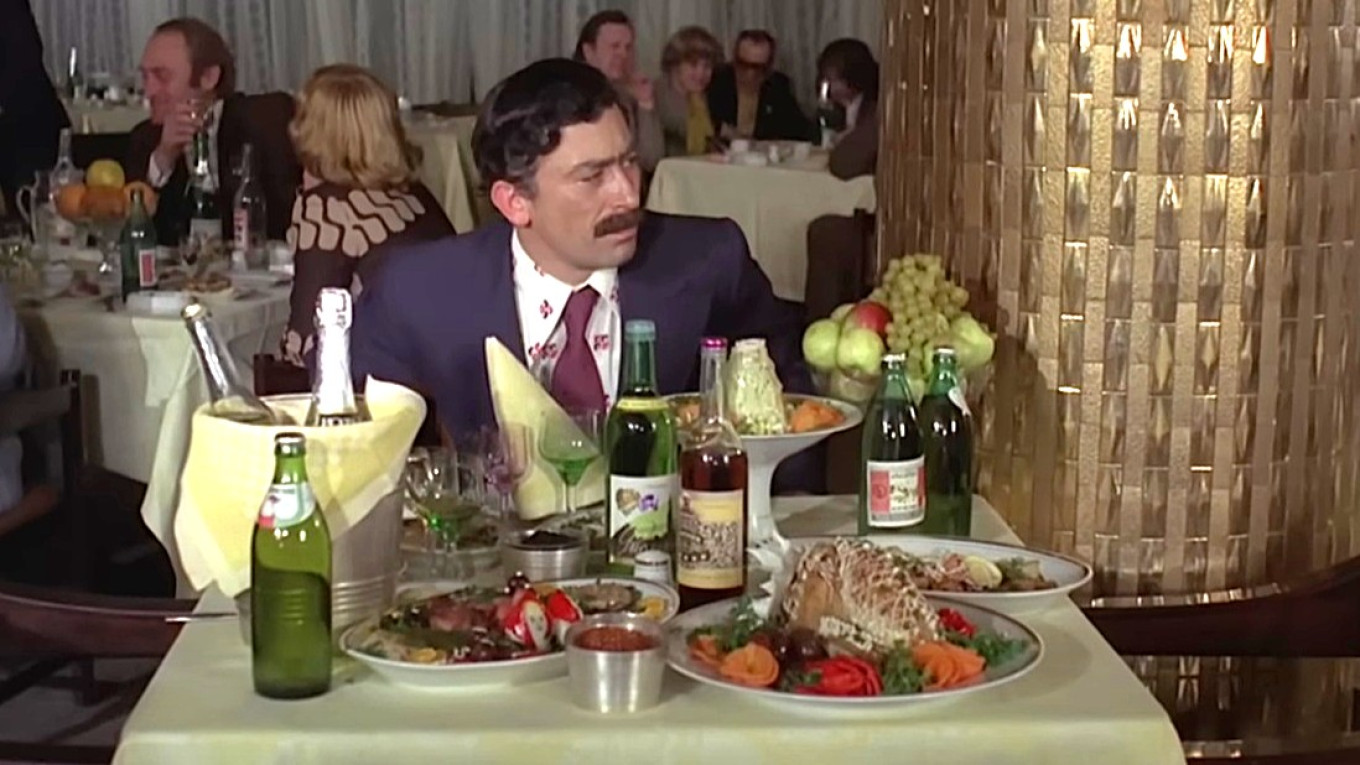 
					 Georgian wine, Armenian cognac and Russian caviar were essential on a respectable table in a Soviet restaurant.					 					Still from the movie “Mimino”				