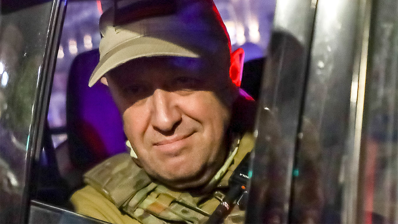 
					Prigozhin looks out from an SUV as he leaves Rostov-on-Don, June 24.					 					AP / TASS				