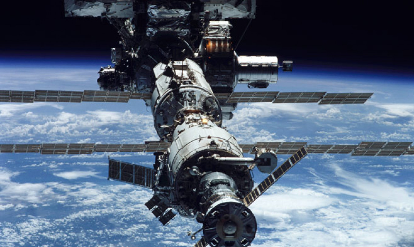 This photo shows the International Space Station after the addition of its 11th part, a truss to begin expanding the station. NASA