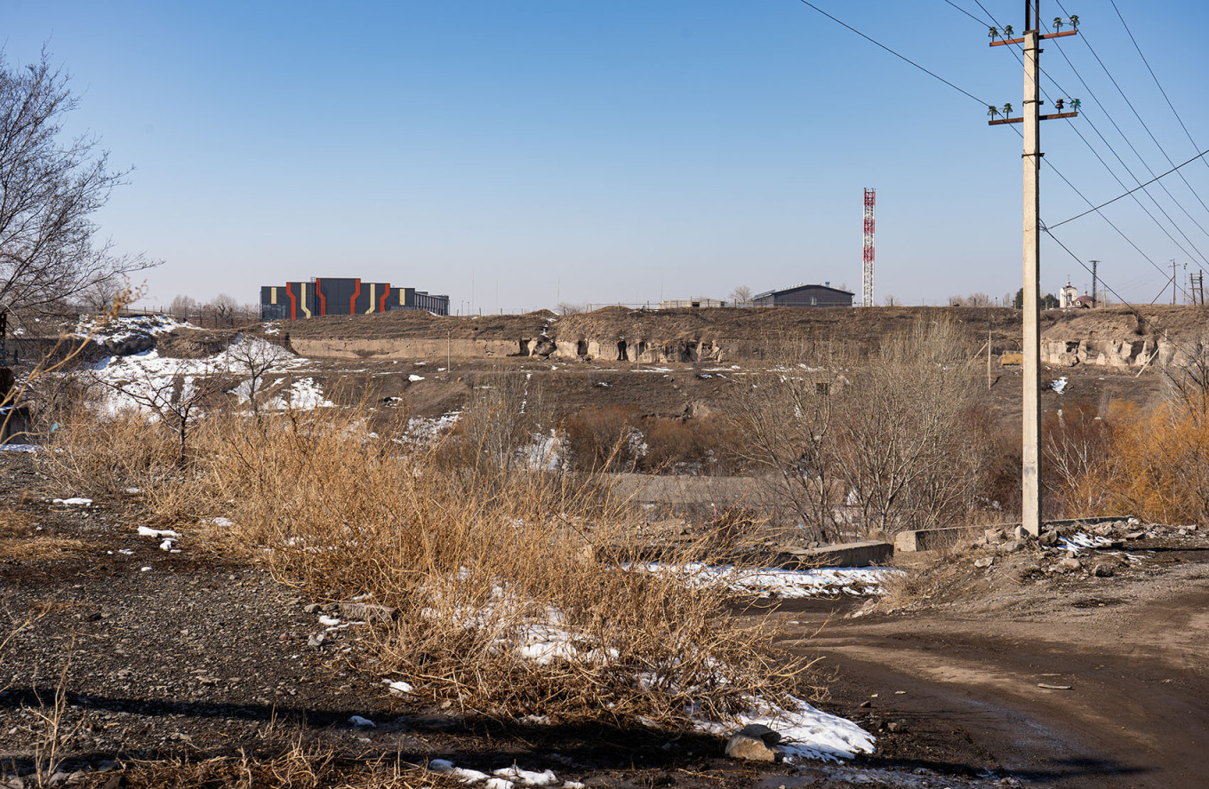 
					Russia’s 102nd military base as seen from a nearby neighborhood.					 					Brawley Benson				