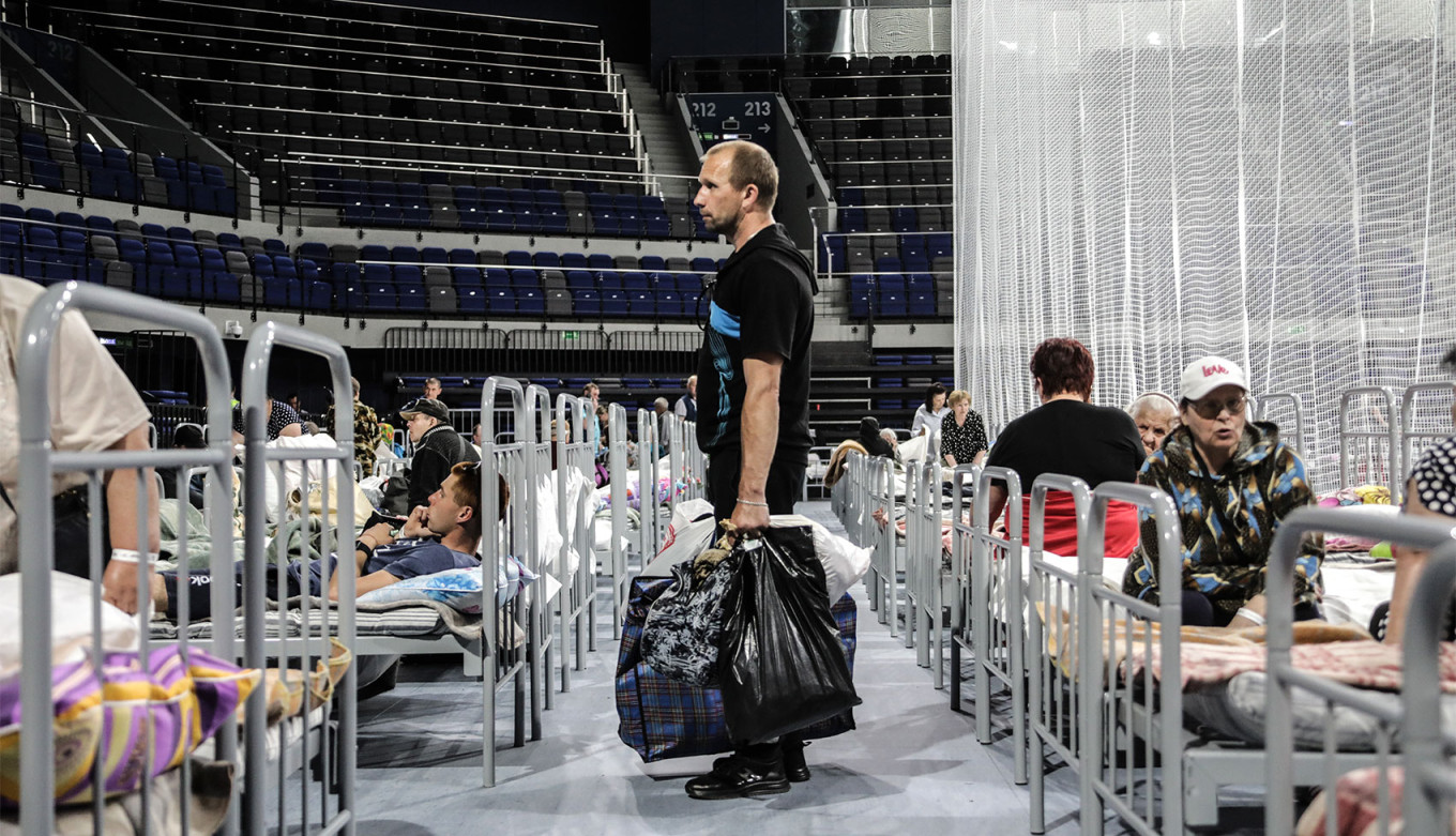 
					Residents of Shebekino in a temporary accommodation center in a Belgorod stadium.					 					Nikita Tsitsagi / NEWS.ru / TASS				