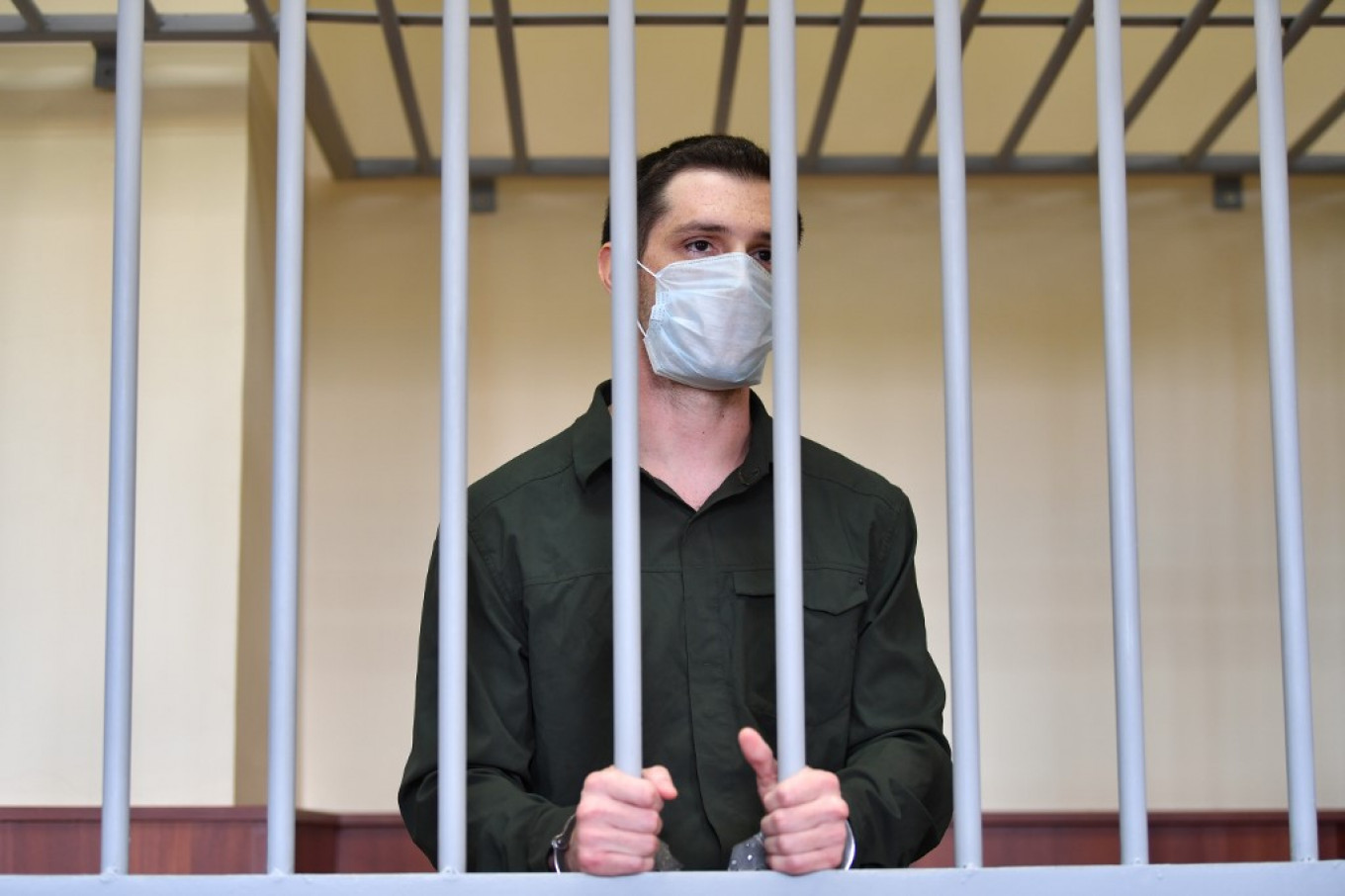 Russian Court Sentences U.S. Ex-Marine to 9 Years for Police Assault