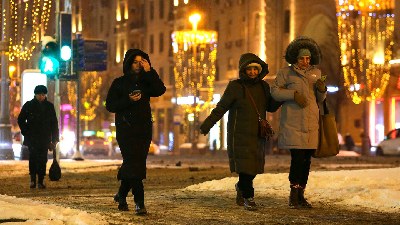 
					People on the street in Moscow.					 					Sergei Vedyashkin / Moskva News Agency				