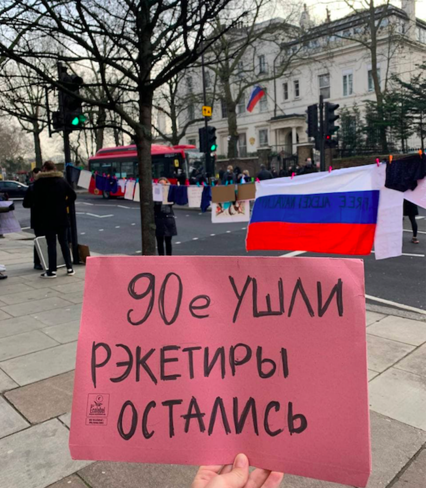 "The 90s have gone. The racketeers remain." A small group of protesters gathered outside the Russian Embassy in London on Saturday.