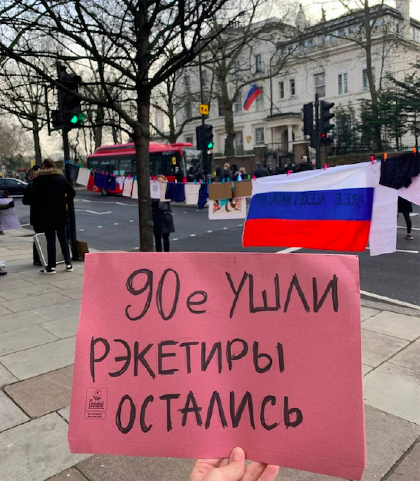 
					"The 90s have gone. The racketeers remain." A small group of protesters gathered outside the Russian Embassy in London on Saturday.					 									