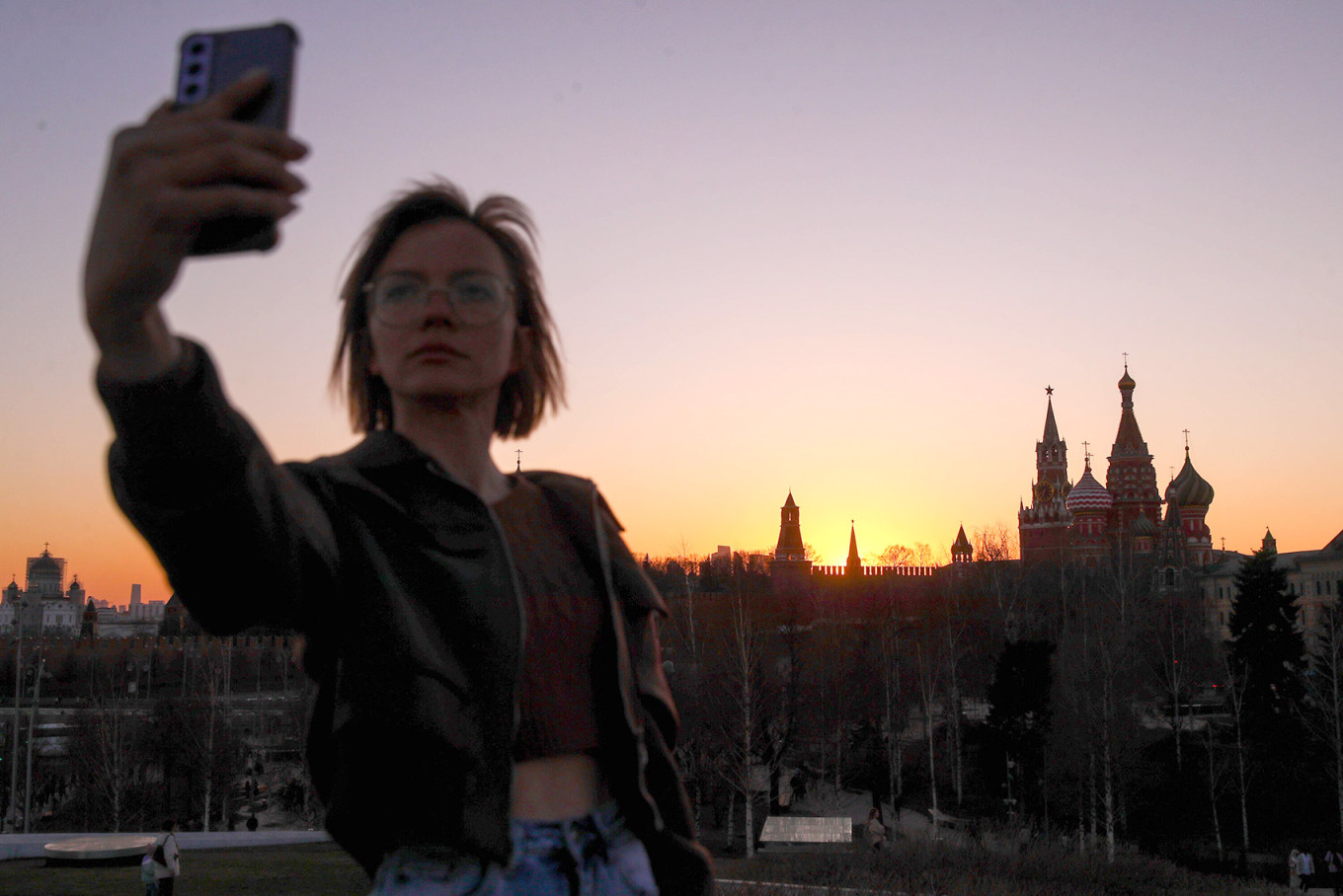 
					A young woman near the Kremlin in Moscow.					 					Vasily Kuzmichenok / Moskva News Agency    				
