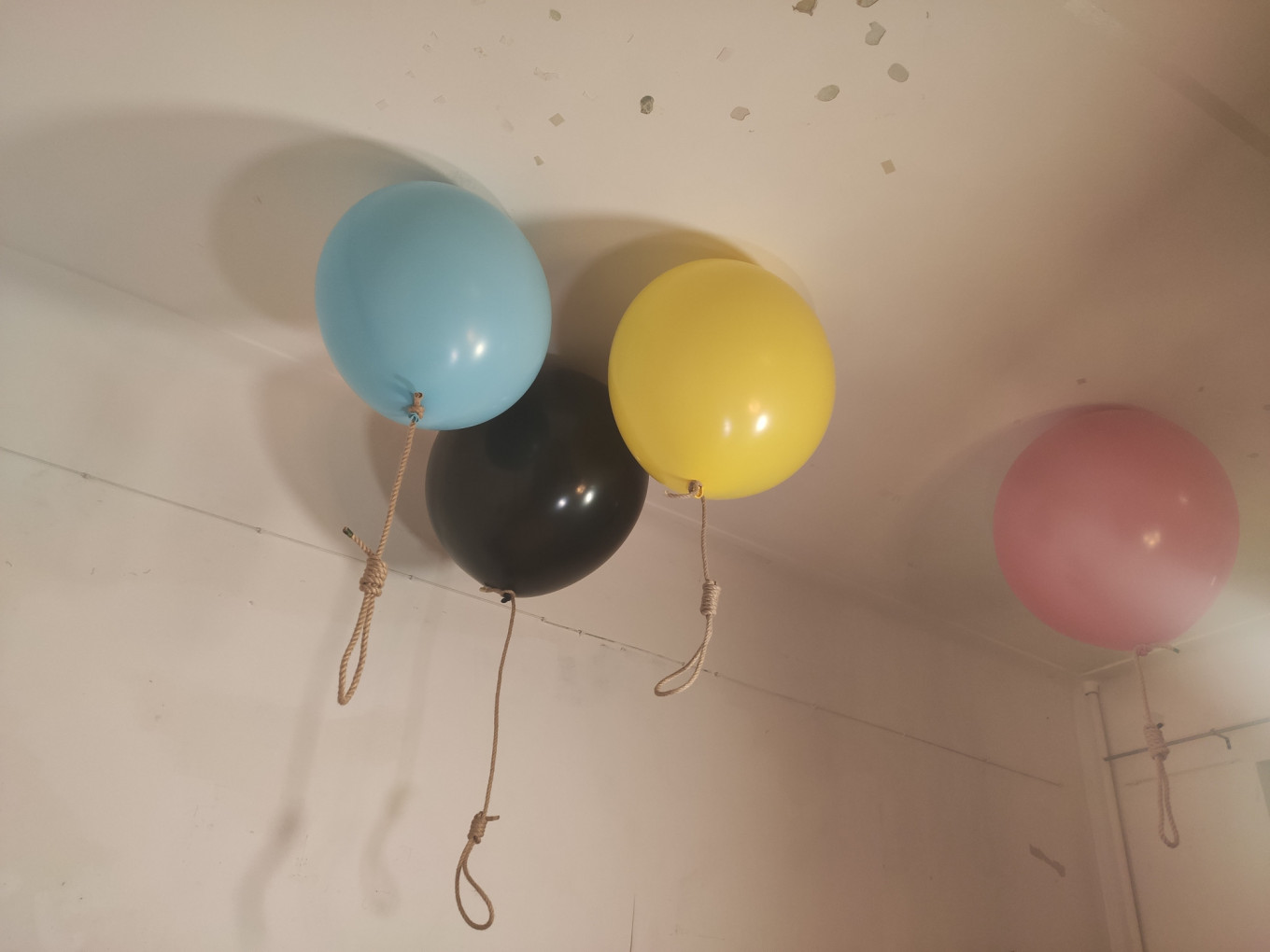 
					These balloons represent the Khachaturyan sisters and their father. 					 					Loretta Marie Perera / MT				