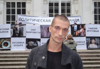 Parcel berømmelse gå på arbejde Russian Activist Who Nailed Testicles to Red Square Charged With Vandalism  Over Ukraine Stunt - The Moscow Times