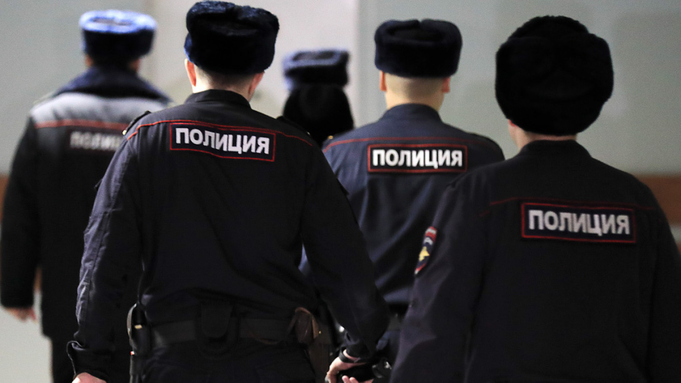 Russian Police Raid Khodorkovsky-Backed Media, Opposition Group - The  Moscow Times