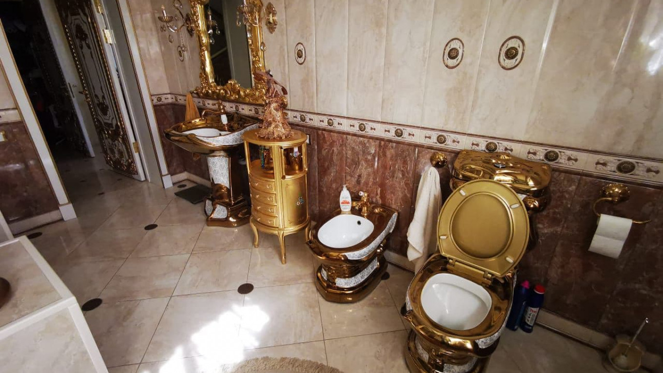 Russian Traffic Cop’s Golden Toilet Steals The Show In Uncovered Police Bribe Scheme