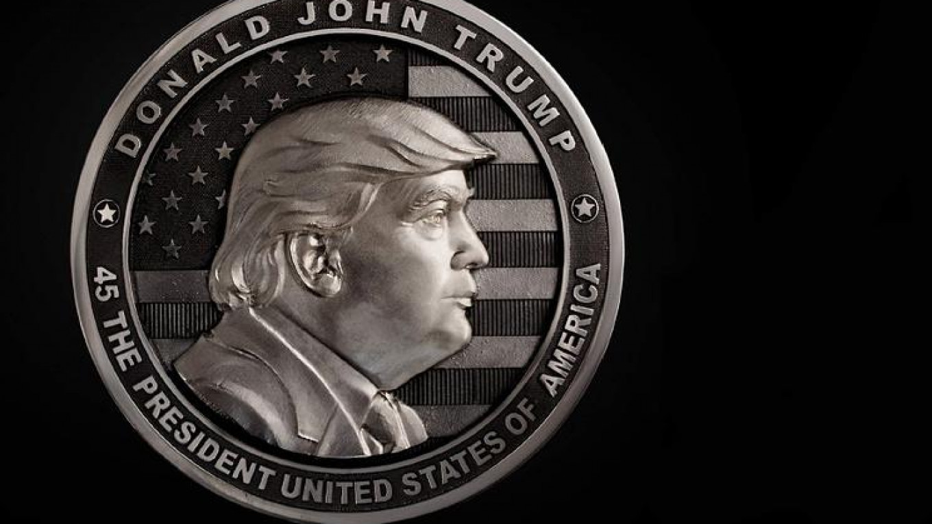 Russian Gunsmiths Release Commemorative Coins Reading 'In Trump We Trust' -  The Moscow Times
