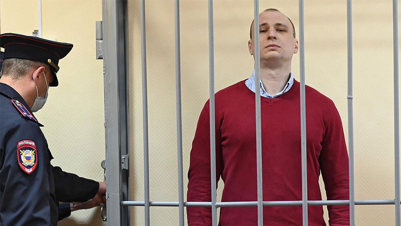 Russian Court Jails . Citizen for Kicking Police Officer - The Moscow  Times