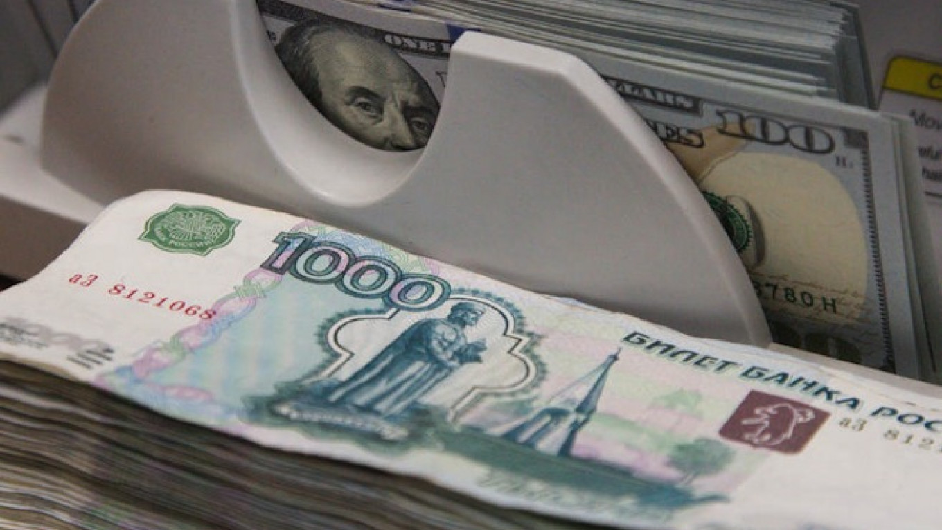 Russias Ruble Falls Below 56 To U S Dollar For First Time This Year