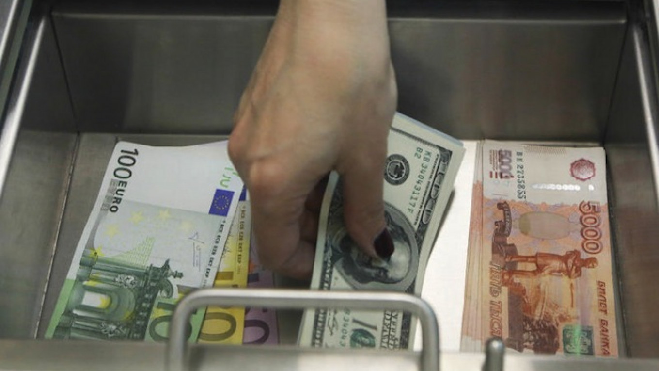 Russian Ruble Continues Decline But Collapse Slows