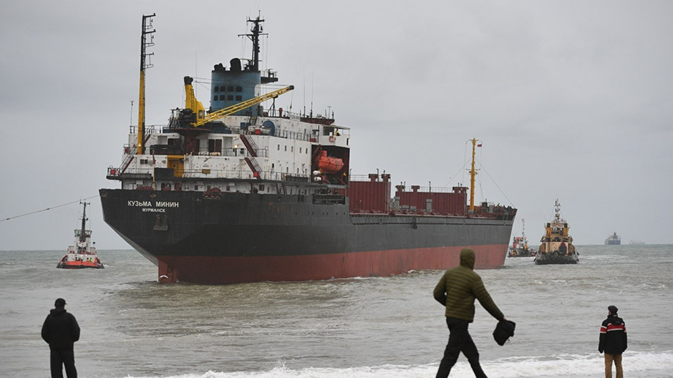 Bid underway to refloat cargo ship aground in Chesapeake Bay